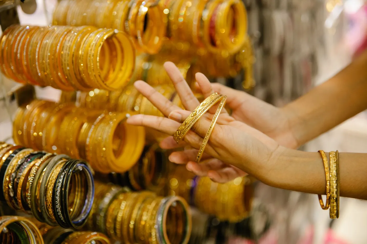 Gold jewellery on display at a jewellery shop counter